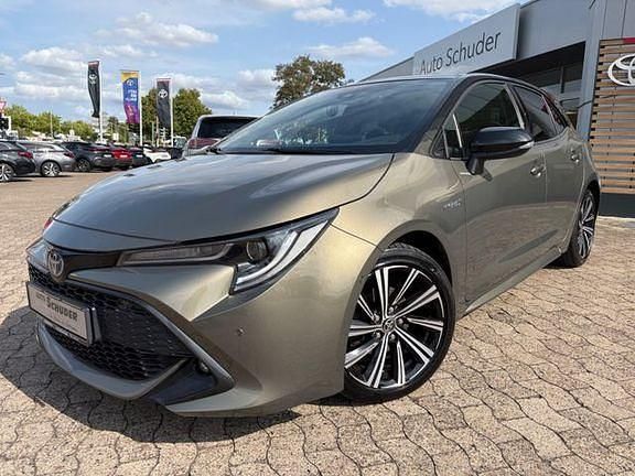 Manganbronze metallic, dach schwarz Gebraucht 2020 Toyota Corolla Style | 16.990 € (Fairer Preis) - Bild 1/4