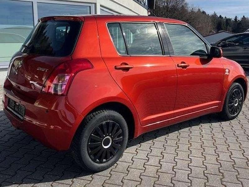 Gebraucht Suzuki Swift 92 PS (67 kW) 2008 Orange/braunmet. Kleinwagen