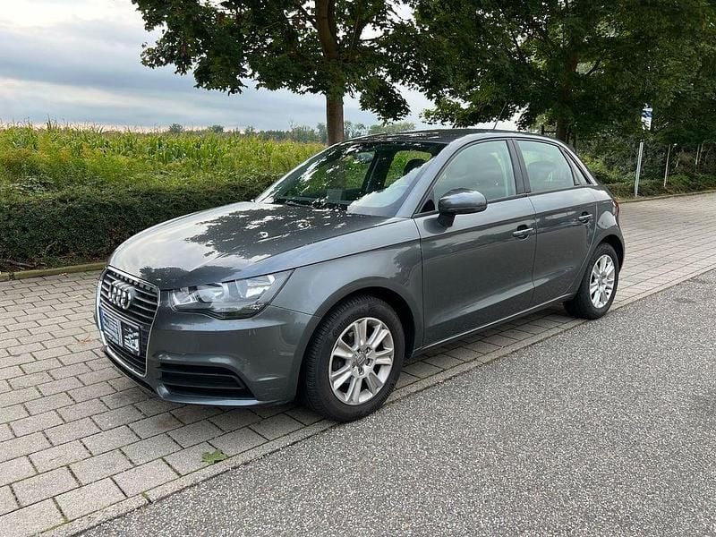 Grau Gebraucht 2014 Audi A1 Sportback Attraction Kleinwagen | 9.450 € (Fairer Preis) - Bild 1/4