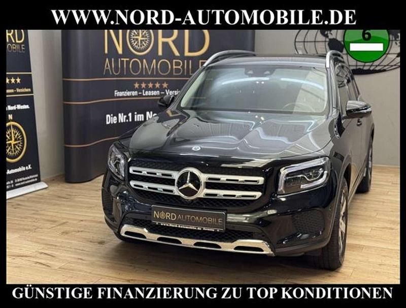 Kosmosschwarz metall (metallic) Gebraucht 2022 Mercedes GLB200 Progressive SUV | 30.450 € (Fairer Preis) - Bild 1/3