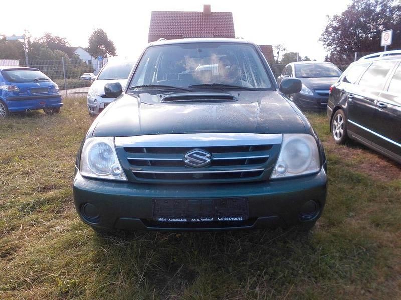 Grün Gebraucht 2005 Suzuki Grand Vitara Comfort SUV | 2.799 € (Superpreis) - Bild 1/4