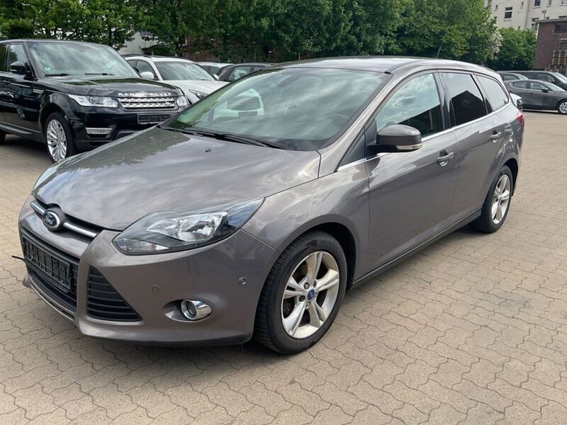 Braun Gebraucht 2012 Ford Focus Champions Edition Kombi | 3.399 € (Fairer Preis) - Bild 1/4