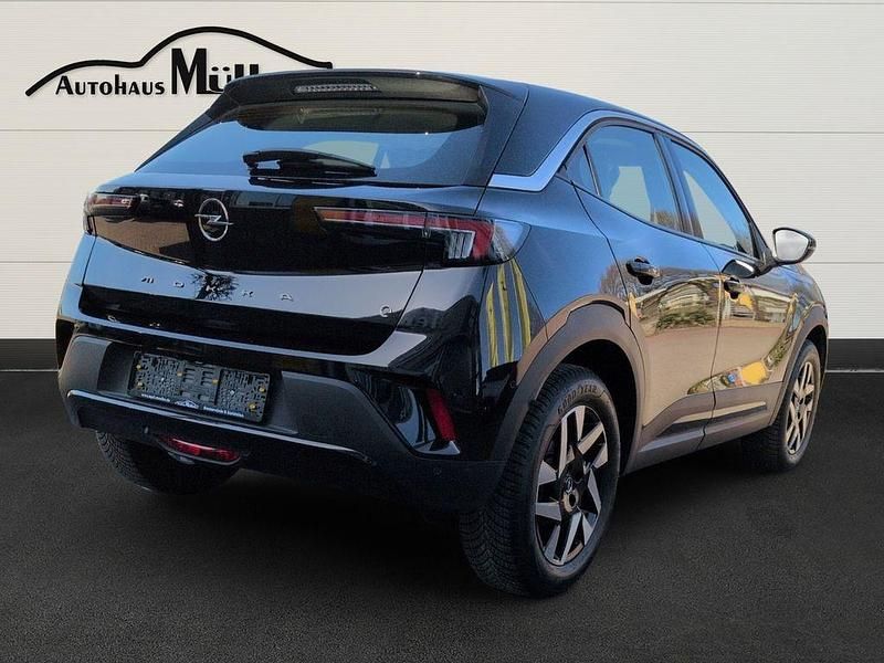 Gebraucht Opel Mokka-e Elegance 100 kW (136 PS) 2024 Lackierung schwarz perla nera/ SUV