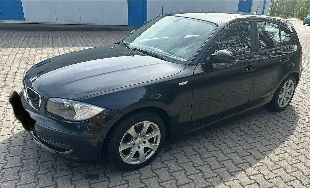 Second-hand BMW 116 122 CP (89 kW) 2009 Negru Hatchback