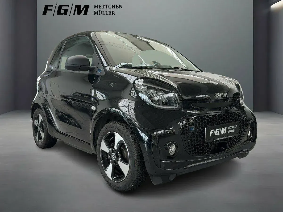 Gebraucht Smart ForTwo Coupé 60 kW (82 PS) 2023 Bodypanels in black Kleinwagen
