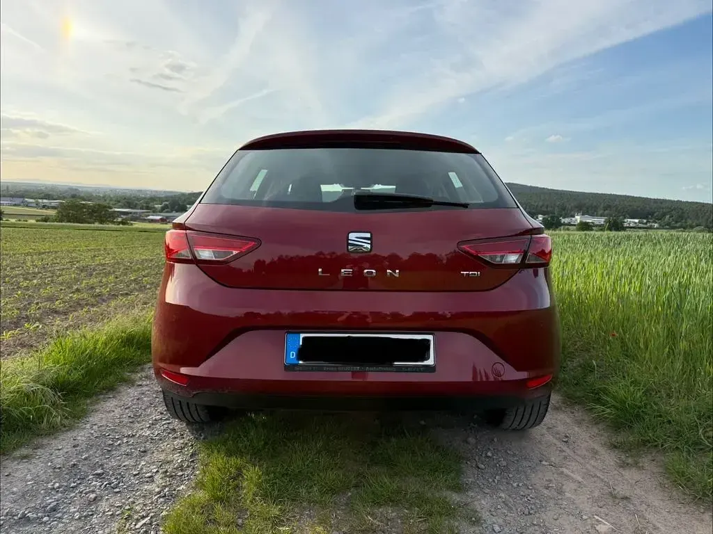Używany Seat Leon Style 150 KM (110 kW) 2014 Czerwony Sedan/Limuzyna