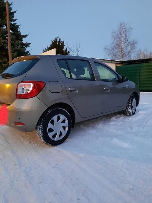Gebraucht Dacia Sandero 90 PS (66 kW) 2014 Braun Limousine