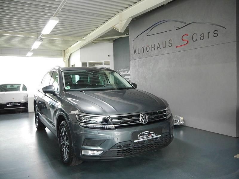 Grau Gebraucht 2016 VW Tiguan Comfortline SUV | 25.950 € (Fairer Preis) - Bild 1/4