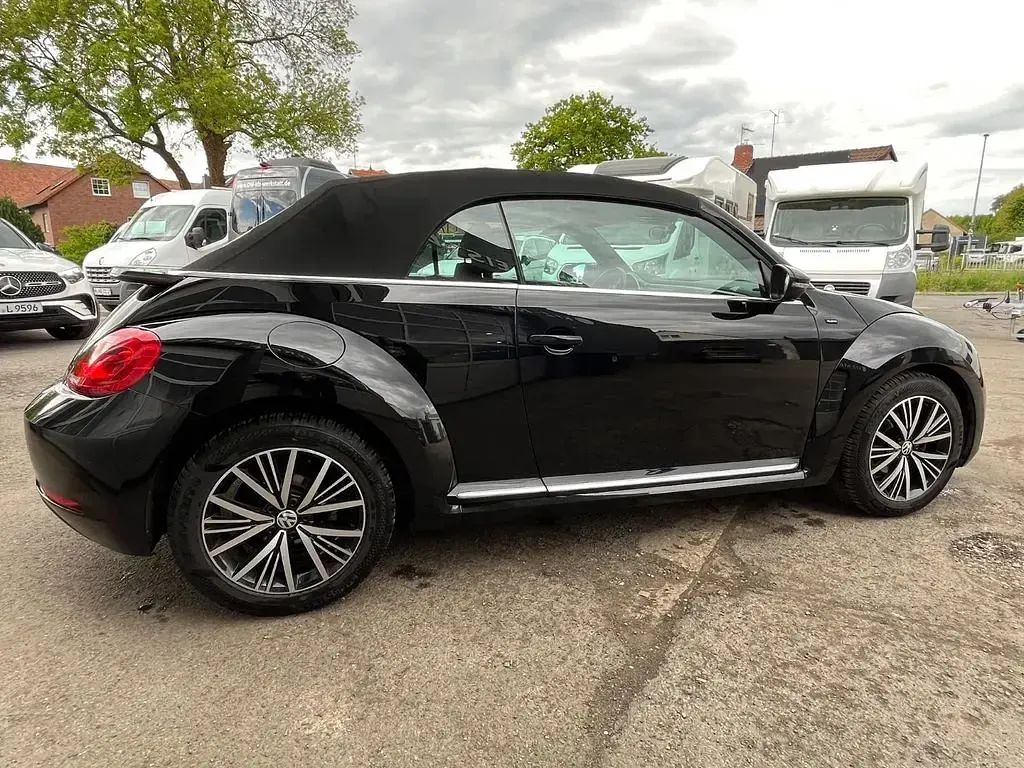 Używany VW Beetle Cabriolet Allstar 105 KM (77 kW) 2016 Czarny Kabriolet