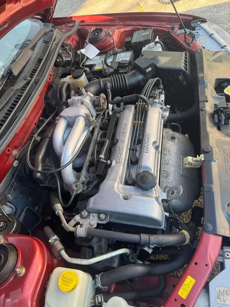 Gebraucht Mazda 323 88 PS (64 kW) 1997 Rot Kleinwagen