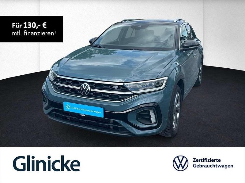 Petroleum blue metallic Gebraucht 2024 VW T-Roc R-line SUV | 32.480 € (Fairer Preis) - Bild 1/1