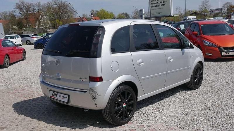 Second-hand Opel Meriva 90 CP (66 kW) 2010 Argintiu Monovolum