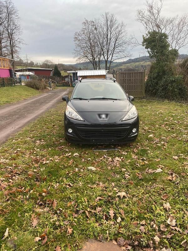 Gebraucht Peugeot 207 95 PS (69 kW) 2011 Schwarz Kombi