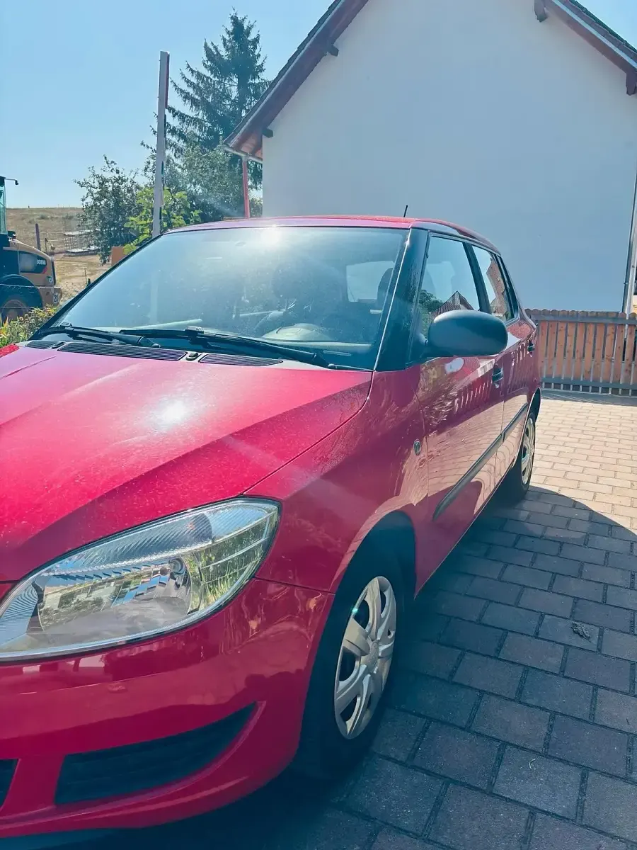 Gebraucht Skoda Fabia 60 PS (44 kW) 2012 Rot Kleinwagen