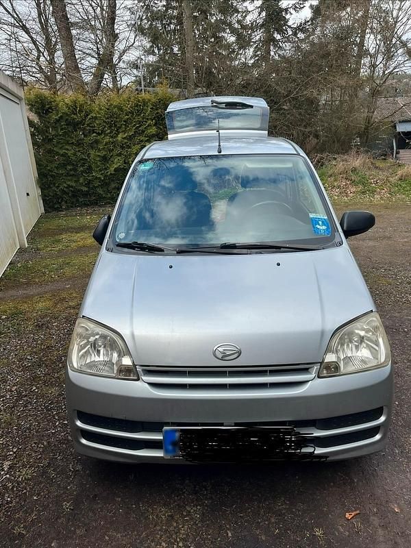 Gebraucht Daihatsu Cuore 58 PS (42 kW) 2006 Silber Kleinwagen