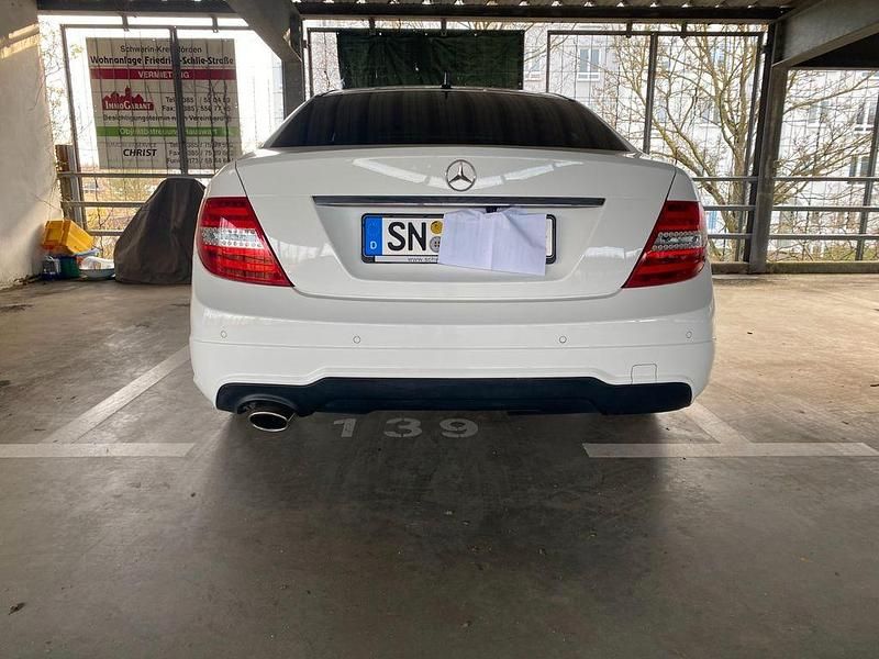 Gebraucht Mercedes C180 AMG line 156 PS (114 kW) 2014 Weiß Coupé