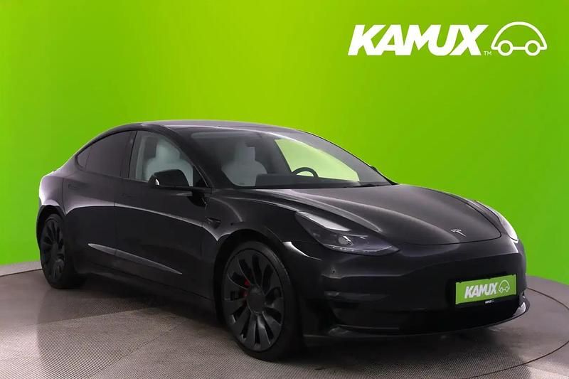 Solid black Gebraucht 2021 Tesla Model 3 Limousine | 28.990 € (Fairer Preis) - Bild 1/4