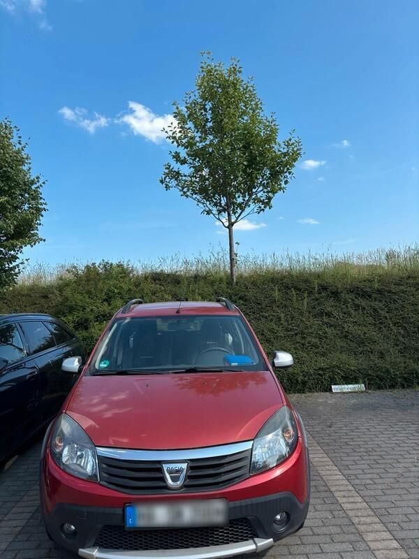 Rot Gebraucht 2012 Dacia Sandero Stepway Kleinwagen | 3.250 € (Superpreis) - Bild 1/4