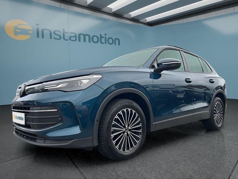 Blau Gebraucht 2024 VW Tiguan SUV | 36.099 € (Fairer Preis) - Bild 1/4