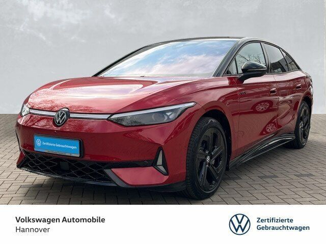 Kings red metallic Gebraucht 2024 VW ID.7 GTX Limousine | 52.350 € - Bild 1/3