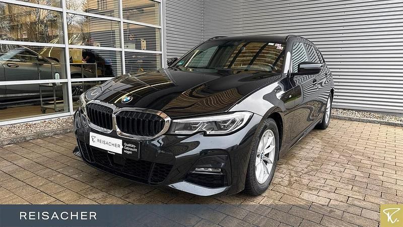 Saphirschwarz metallic Gebraucht 2021 BMW 320 M Sport Kombi | 28.990 € (Guter Preis) - Bild 1/4