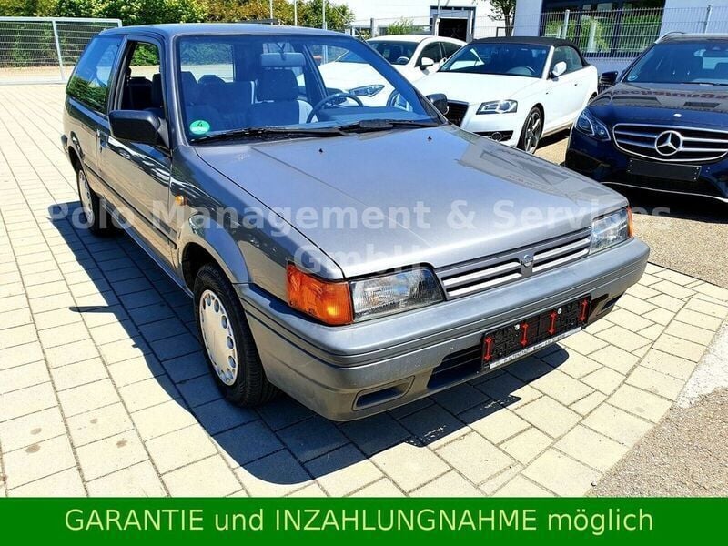 Grau metallic Gebraucht 1990 Nissan Sunny Coupé | 4.980 € - Bild 1/4
