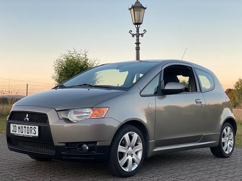 Grau Gebraucht 2010 Mitsubishi Colt Kleinwagen | 4.495 € (Etwas zu teuer) - Bild 1/4