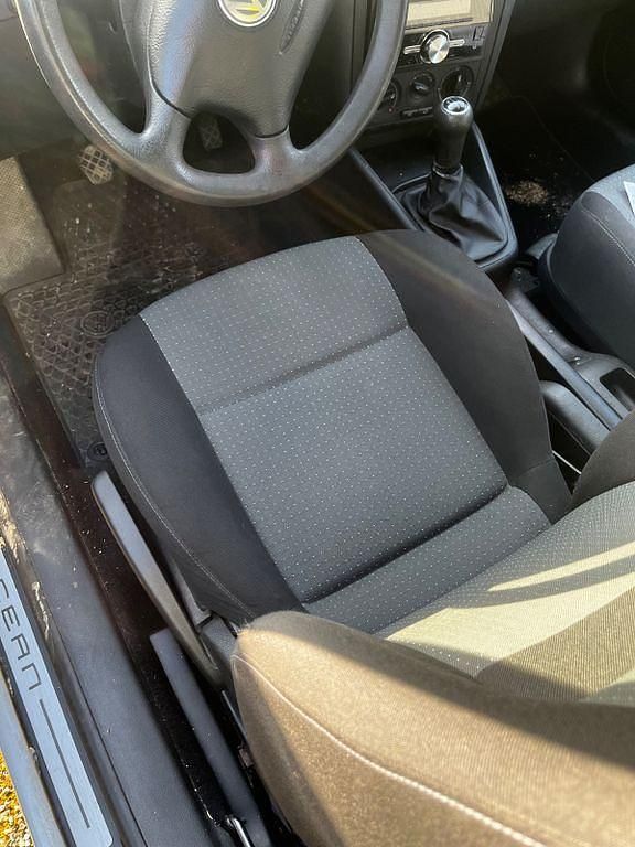 Second-hand VW Golf IV 75 CP (55 kW) 2003 Negru Berlinǎ