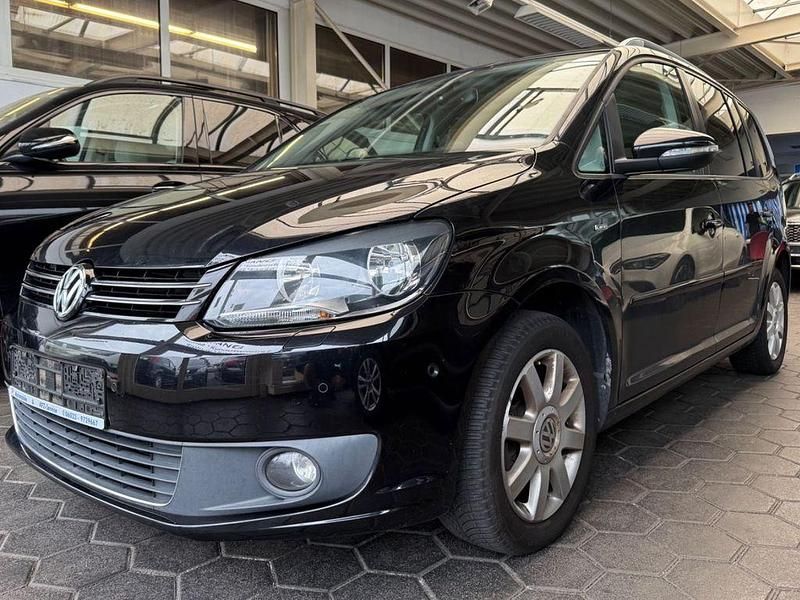 Schwarz Gebraucht 2013 VW Touran Life Van / Kleinbus | 8.999 € (Fairer Preis) - Bild 1/4