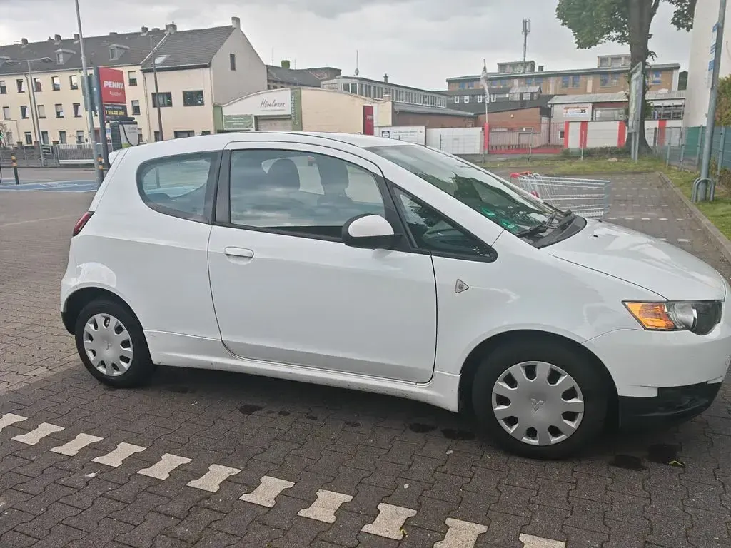 Begagnad Mitsubishi Colt 75 HK (55 kW) 2012 Vit Halvkombi