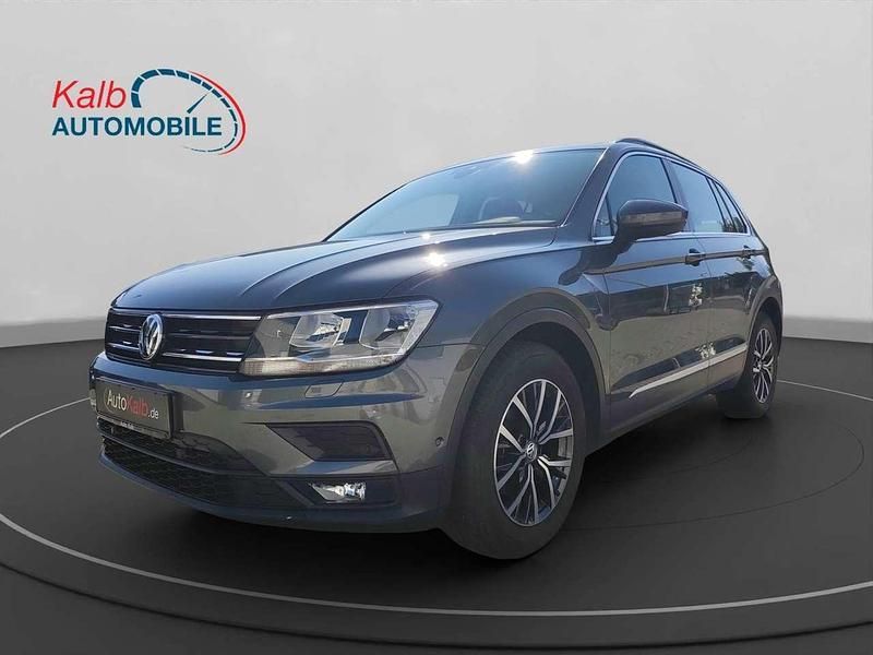 Grau Gebraucht 2018 VW Tiguan Comfortline SUV | 18.888 € (Etwas zu teuer) - Bild 1/4