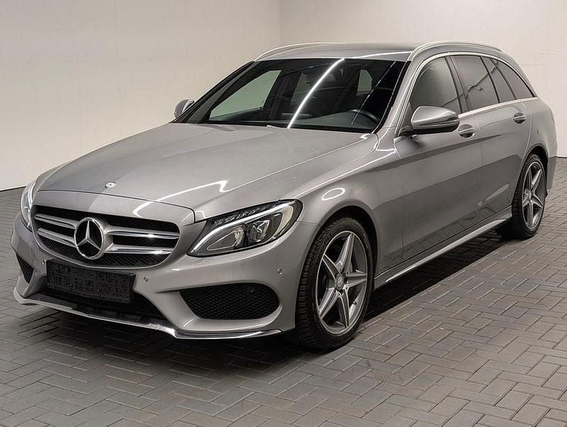 Palladiumsilbermet. Gebraucht 2016 Mercedes C160 AMG line Coupé | 17.480 € (Guter Preis) - Bild 1/4
