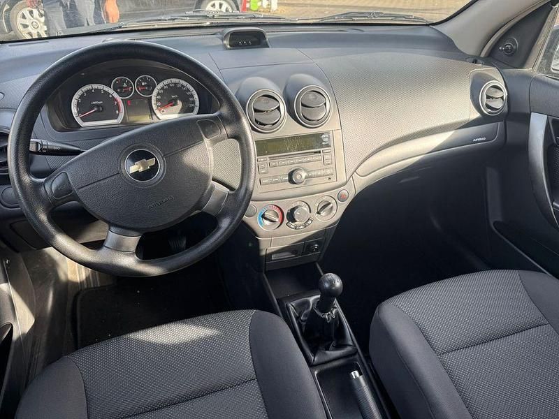 Second-hand Chevrolet Aveo 72 CP (52 kW) 2009 Negru Berlinǎ