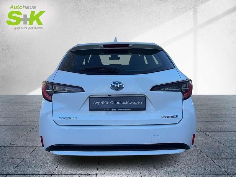 Gebraucht Toyota Corolla Basis 141 PS (103 kW) 2023 Schneeweiß Kombi