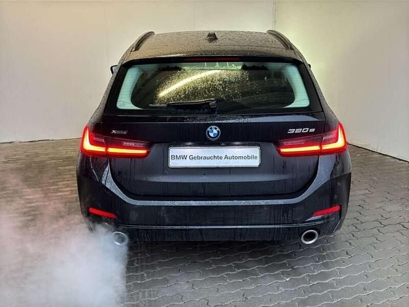 Gebraucht BMW 320e 272 PS (200 kW) 2022 Schwarz uni Kombi
