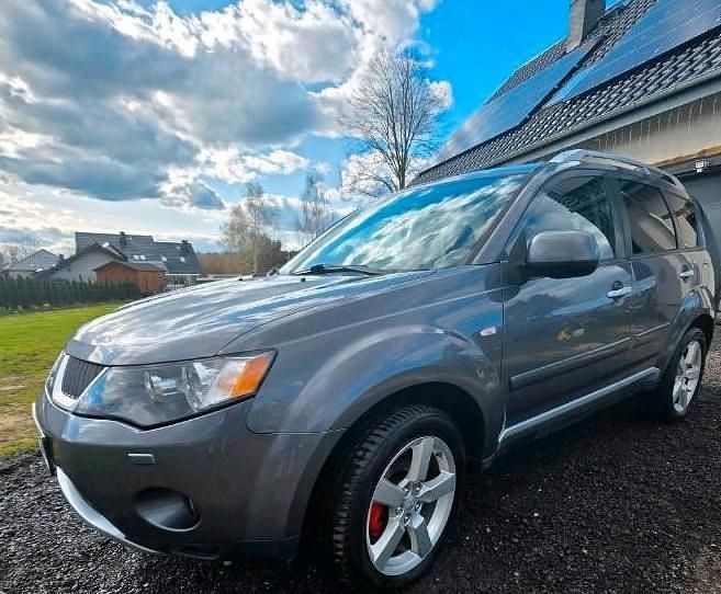 Grau Gebraucht 2009 Mitsubishi Outlander SUV | 5.399 € (Teuer) - Bild 1/4