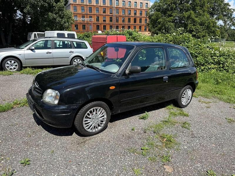 Schwarz Gebraucht 1999 Nissan Micra Basis Kleinwagen | 2.499 € (Fairer Preis) - Bild 1/4