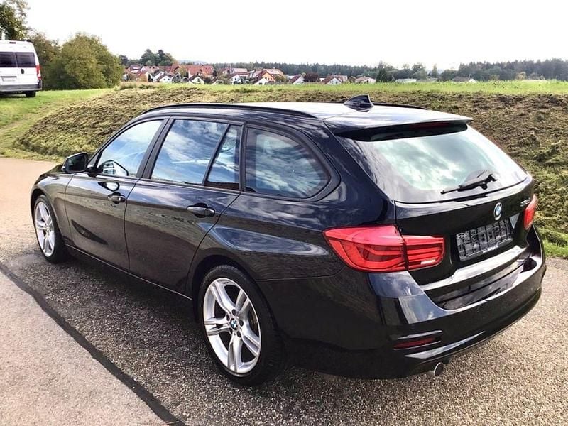 Gebraucht BMW 318 Performance 150 PS (110 kW) 2018 Schwarz ii/bonnet fluid black Kombi