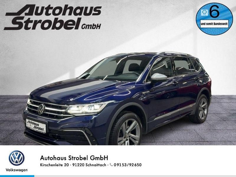Blau Gebraucht 2022 VW Tiguan Allspace R-line SUV | 29.990 € (Fairer Preis) - Bild 1/3