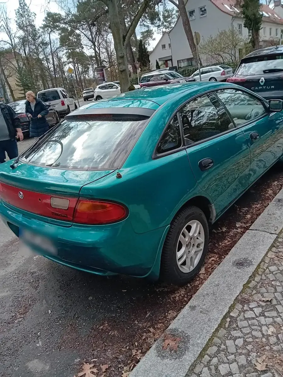 Gebraucht Mazda 323 88 PS (64 kW) 1994 Grün Limousine