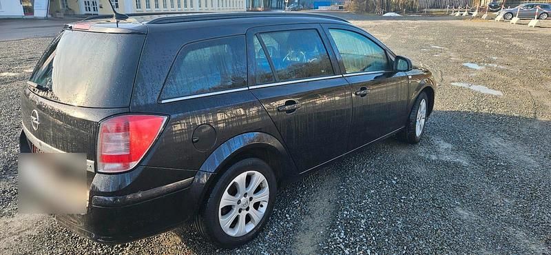 Gebraucht Opel Astra 125 PS (91 kW) 2010 Schwarz Kombi