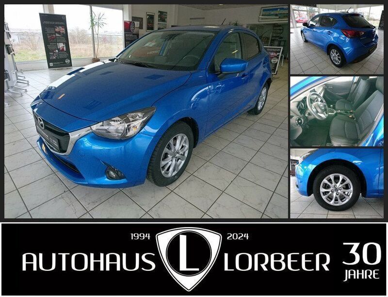 Blau Gebraucht 2015 Mazda 2 Exclusive Limousine | 10.990 € (Fairer Preis) - Bild 1/4