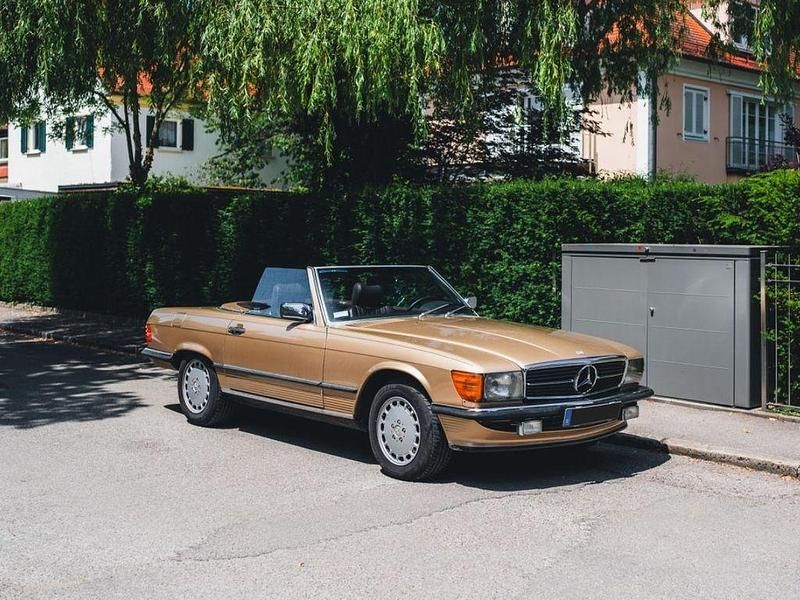 Gold Gebraucht 1986 Mercedes 560 Cabrio | 44.900 € - Bild 1/4