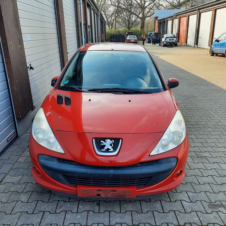 Gebraucht Peugeot 206+ 68 PS (50 kW) 2011 Rot Kleinwagen