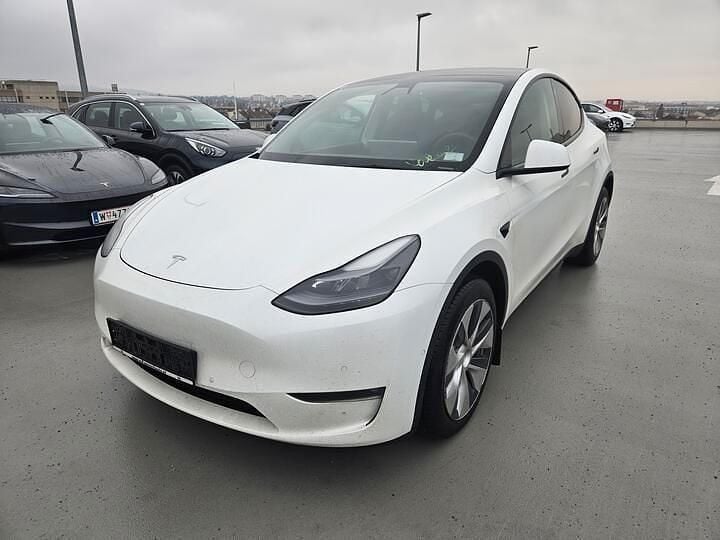 Weiß Gebraucht 2021 Tesla Model Y SUV | 25.080 € (Teuer) - Bild 1/4