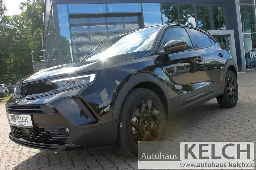 Gebraucht Opel Mokka 136 PS (100 kW) 2024 Karbon schwarz (metallic) (metallic) SUV