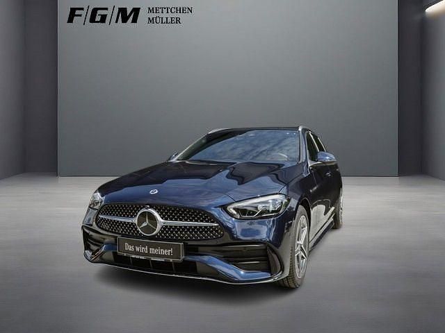 Cavansitblau metalliclack Gebraucht 2023 Mercedes C300e AMG Kombi | 39.390 € (Fairer Preis) - Bild 1/4