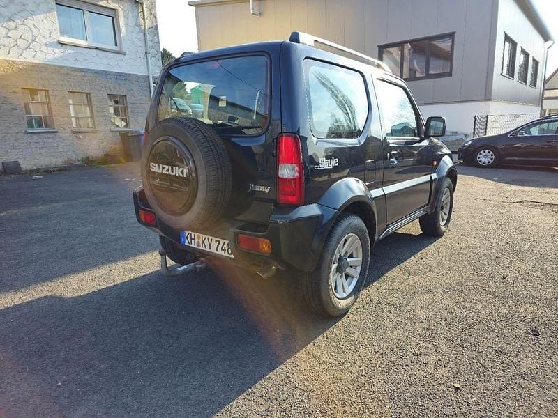 Usado Suzuki Jimny Style 86 HP (63 kW) 2012 Preto SUV
