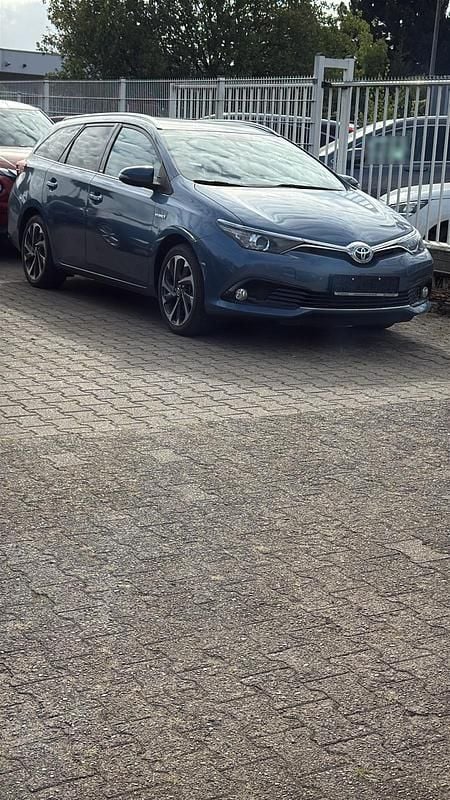 Gebraucht Toyota Auris Hybrid 100 PS (73 kW) 2016 Blau Kombi