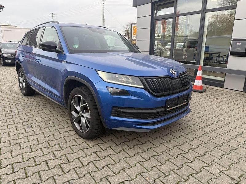 Blau (metallic) Gebraucht 2021 Skoda Kodiaq SportLine SUV | 27.990 € (Guter Preis) - Bild 1/4